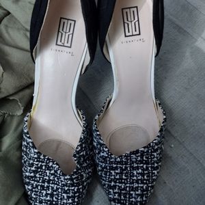 Signature black and white heels size 9